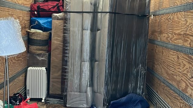 Packed moving truck with furniture items