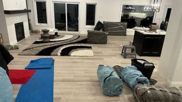 Living room with furniture in transition